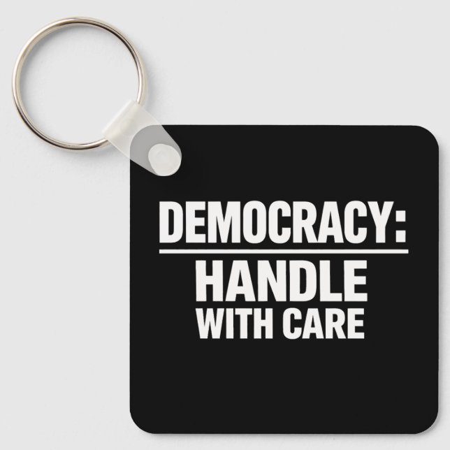 Chaveiro Handle Democracy With Care (Frente)