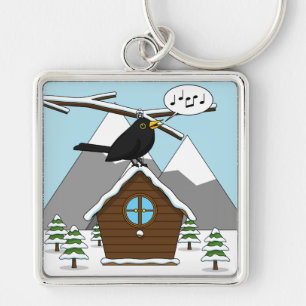 Chaveiro Happy Blackbird Cantando na paisagem de inverno