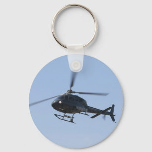 Chaveiro helicóptero voador
