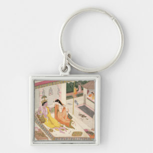 Chaveiro Krishna e Radha em uma cama em um palácio do