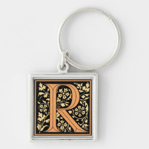 Chaveiro Letra Preta e Dourada "R"