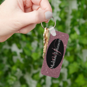 Chaveiro Letras elegantes a ouro rosa em pulseira preta