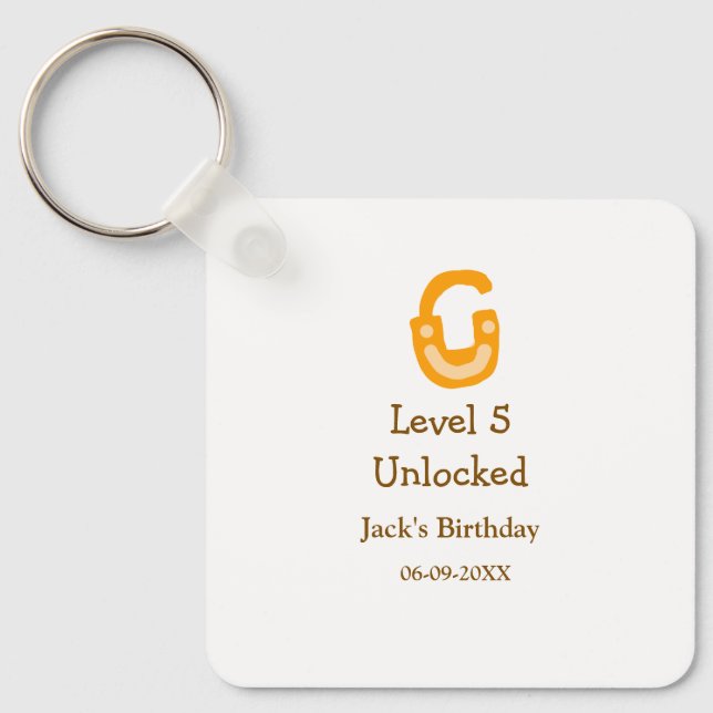 Chaveiro Level 5 unlocked lock orange brown happy birthday  (Frente)
