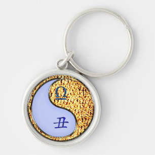 Chaveiro Libra e Ox de Fogo