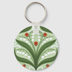 Chaveiro Lily do vale e a simetria de joias em verde.