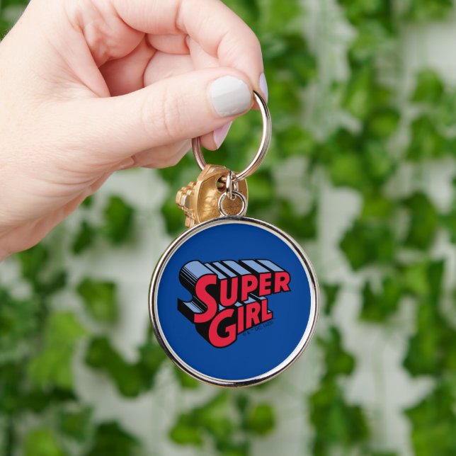 Chaveiro Logotipo de nome empilhado da Supergirl vermelha e (Mão)