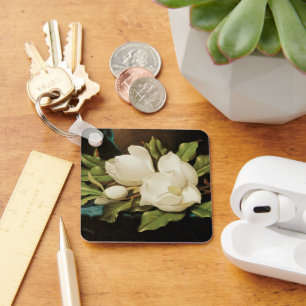 Chaveiro Magnólias Gigantes sobre um Tecido de Veludo Azul 