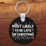 Chaveiro Mais Provavelmente Atrasado No Pajama De Natal<br><div class="desc">Mais Provavelmente Atrasado Nas Luzes De Natal Papai Noel Hat</div>