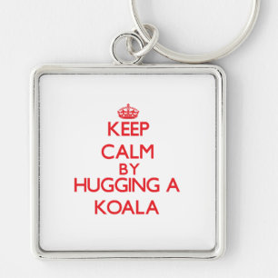 Chaveiro Mantenha a calma abraçando um Koala