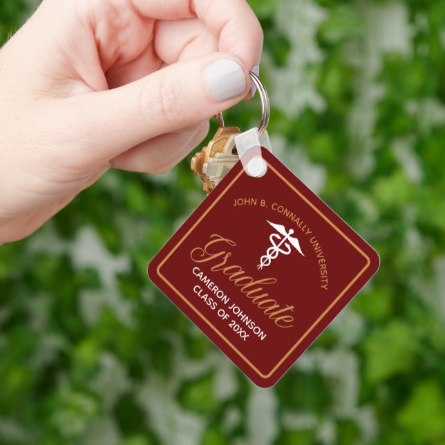 Chaveiro Maroon Dourado da Faculdade de Medicina (Mão)