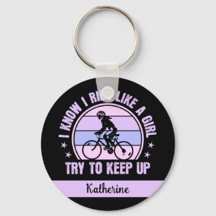 Chaveiro Menina de ciclismo tenta manter a bicicleta retrô
