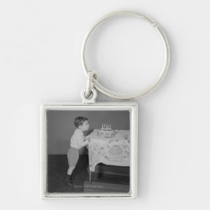 Chaveiro Menino que funde para fora velas