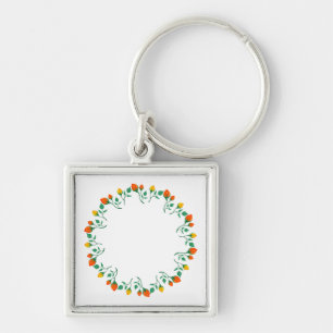 Chaveiro Moldura redonda floral com flor amarela e rosa ver
