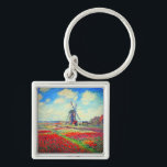 Chaveiro Monet Tulips Windmill<br><div class="desc">Chaveiro com a pintura de Claude Monet em flores e moinhos de vento. Lindos e coloridos campos de tulipas vermelhas,  cor-de-rosa e amarelas ao lado de um moinho de vento e casa na Holanda. Um presente de Monet excelente para fãs do impressionismo e da arte francesa.</div>
