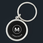Chaveiro Monograma Clássico Preto Mínimo<br><div class="desc">Chaveiro redondo com mínimo monograma apresenta um fundo preto com o seu nome e nome na tipografia de blocos clássicos em branco para uma aparência profissional clássica.</div>