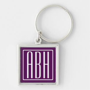 Chaveiro Monograma de iniciais Branco no Roxo Fundo
