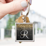 Chaveiro Monograma Dourado de brilho preto com brilho perso<br><div class="desc">Personalize facilmente essa moda elegante design de chaveiro com bonito brilho dourado em um fundo metálico escovado preto.</div>