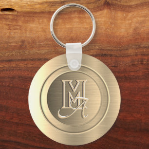 Chaveiro Monograma Gravado em Aço Dourado Metálico