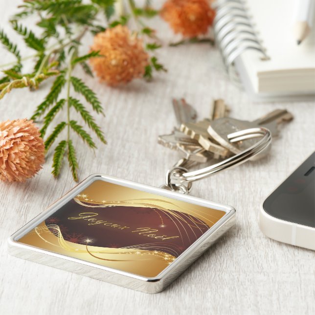 Chaveiro Motivo de Natal ouro com fundo vermelho... (Lateral)