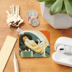 Chaveiro Mulher do art deco do vintage que reclina no sofá