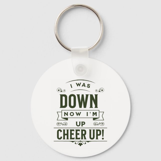 CHAVEIRO NOW I'M UP CHEER UP ROUND KEYCHAIN  (Frente)