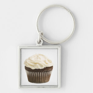 Chaveiro O cupcake com crosta de gelo do chocolate, estúdi