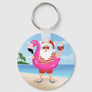 Chaveiro Papai Noel com anel inflável flamingo