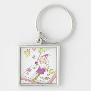 Chaveiro Papai Noel que senta-se no livro