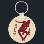 Chaveiro Para o Skateboarders Skateboard Graphic<br><div class="desc">Crie um pequeno presente personalizado para seu skater favorito ou um skate a favor do partido. Este chaveiro apresenta uma ilustração em estilo silhueta de um skate em forma vermelha escura contra fundo de madeira falsa.</div>