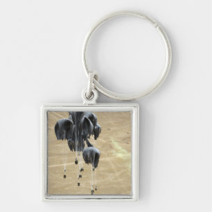 Chaveiro Paraquedas do sistema de entrega de contentores