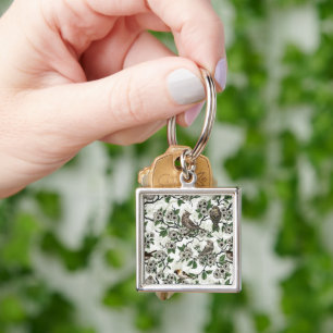 Chaveiro Pássaros e flor de cerejeira sobre branco