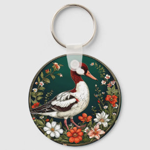 Chaveiro Pato Elegante Rodeado por Flores Vibrantes