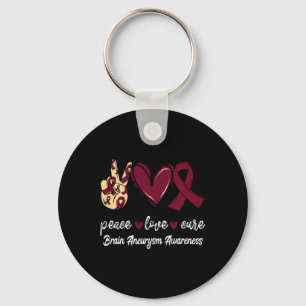 Chaveiro Peace Love Cure Brain Aneurysm Burgundy Ribbon Awa