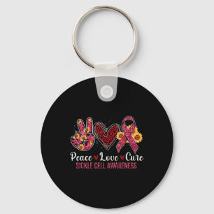 Chaveiro Peace Love Cure Burgundy Friso Célula Falsiforme A