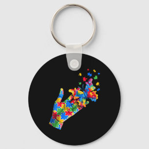 Chaveiro Peças de Puzzle de Mão e Borboleta Fofa Conscienti