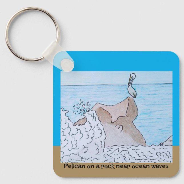 Chaveiro Pelicano numa rocha perto das ondas do oceano (Frente)