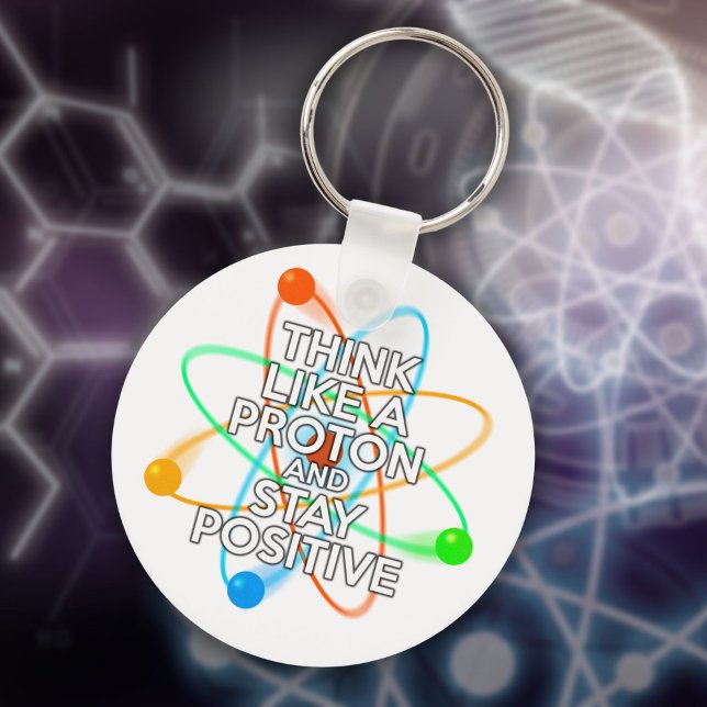 CHAVEIRO PENSE COMO UM PRÓTON E PERMANEÇA POSITIVO (THINK LIKE A PROTON AND STAY POSITIVE KEYCHAIN)