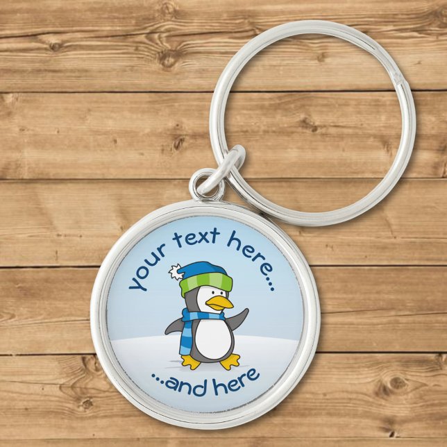 Chaveiro Pequeno pinguim andando na neve (Criador carregado)