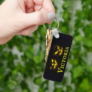 Chaveiro Personalised yellow on black creepy pumpkin faces