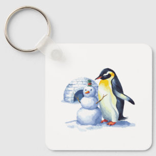 Chaveiro Pinguim-d'água construindo um boneco de neve