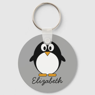 Chaveiro Pinguim de desenho animado bonito com fundo de cin