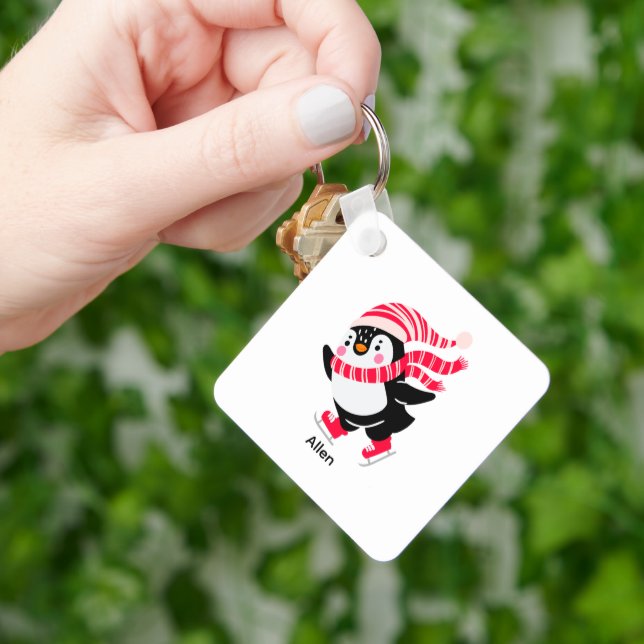 Chaveiro Pinguim de Natal num Chapéu e Escarpo em Skates (Mão)