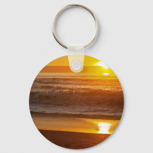 Chaveiro Por do sol dourado na praia de Horsfall