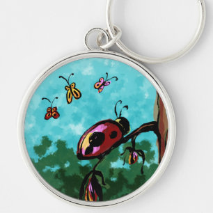 Chaveiro Premium, Ladybug em uma pintura de ramifi