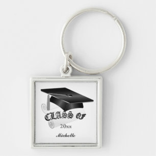 Chaveiro preto e de prata da graduação