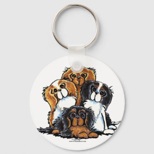 Chaveiro Quatro Spaniels de rei Charles descuidados