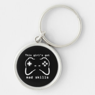 Chaveiro Rapariga tem controladora de videogame de habilida