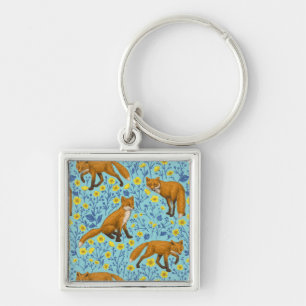 Chaveiro Raposas e ampolas em azul-piscina