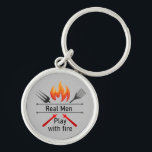 Chaveiro Real Men Play with Fire Fun BBQ Keychain<br><div class="desc">Real Men Play with Fire Fun BBQ Grill Quote  Perfect for any man in your life that loves to Barbeque BBQ</div>