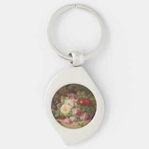 Chaveiro Rosa no chão da floresta com borboletas